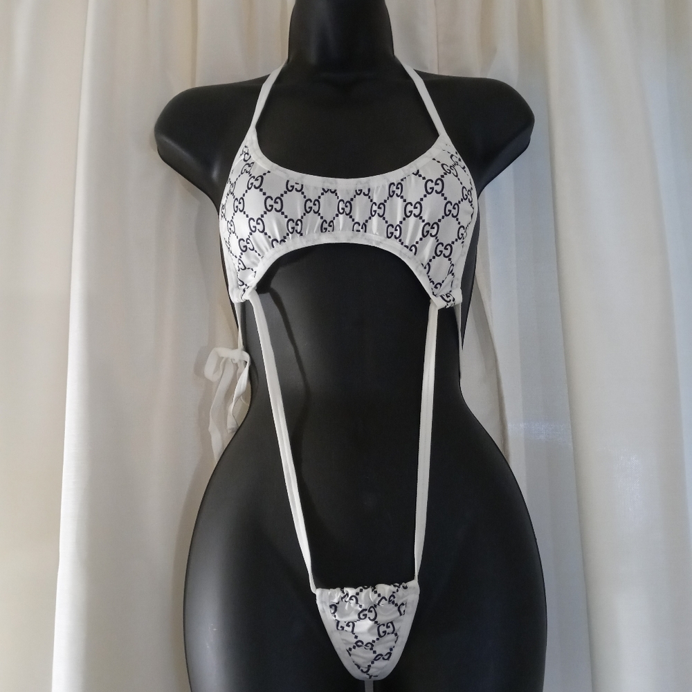 designer inspired one-piece.. new... $32